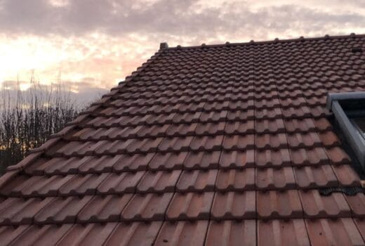 Exemple de toiture en tuiles terre cuite rénovée par GME Bâtiment